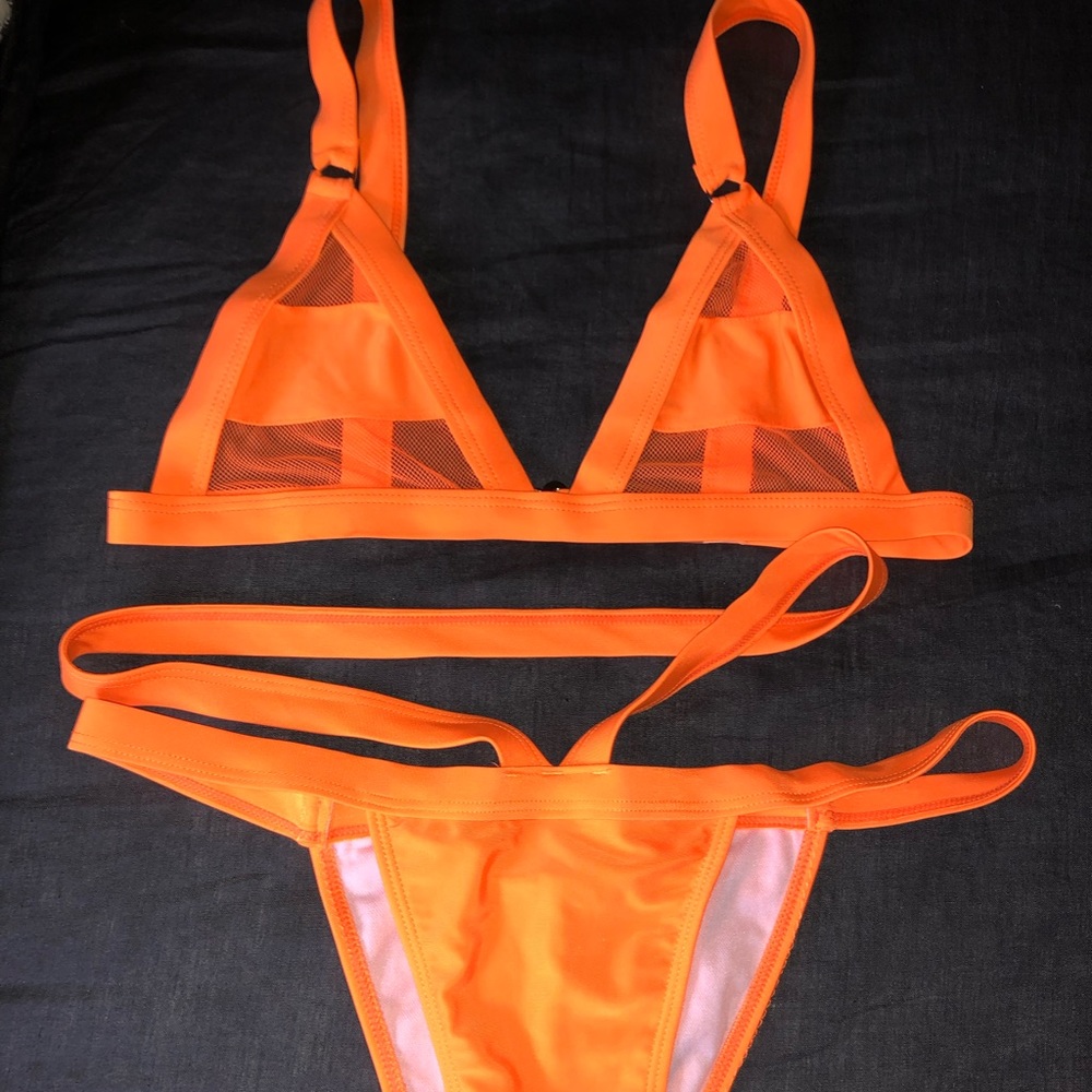 Orange mesh top Bikini with a teapot bottoms